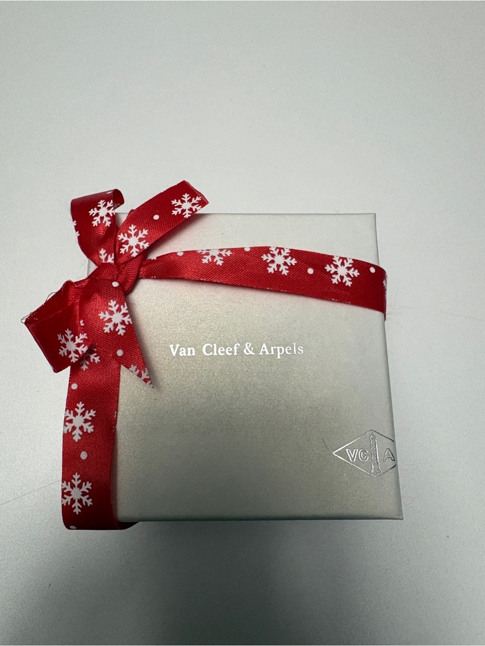 Van Cleef & Arpels Silver Box with Festive Red Snowflake Ribbon and jewelry box